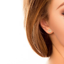 Solvar Gold Claddagh Earrings in ear | The Scottish Company