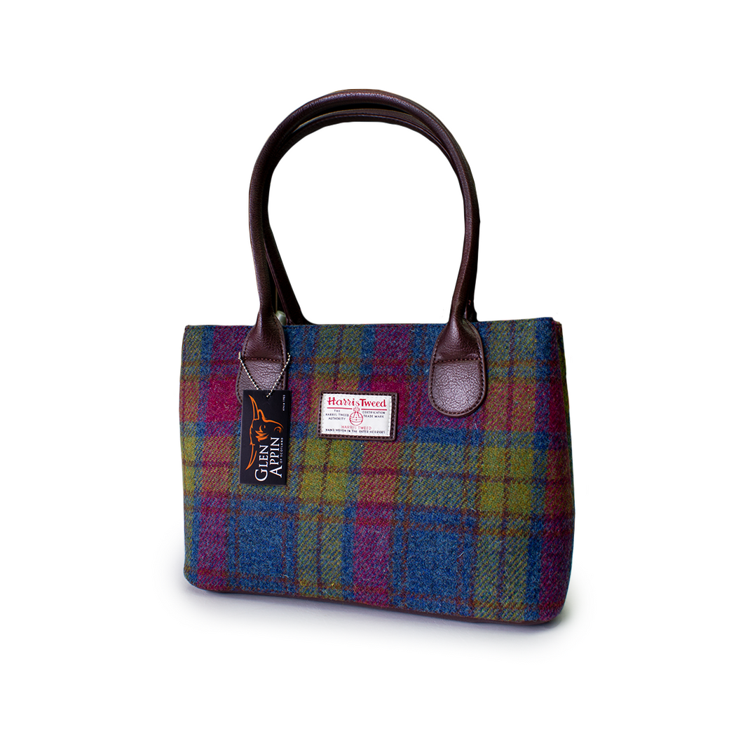 Harris Tweed is world renowned as the only hand-woven commercial cloth and is governed very carefully with their licences.  To have the Harris Tweed label is a privillage.  This handbag is available online and in-store from The Scottish Company, Toronto, 